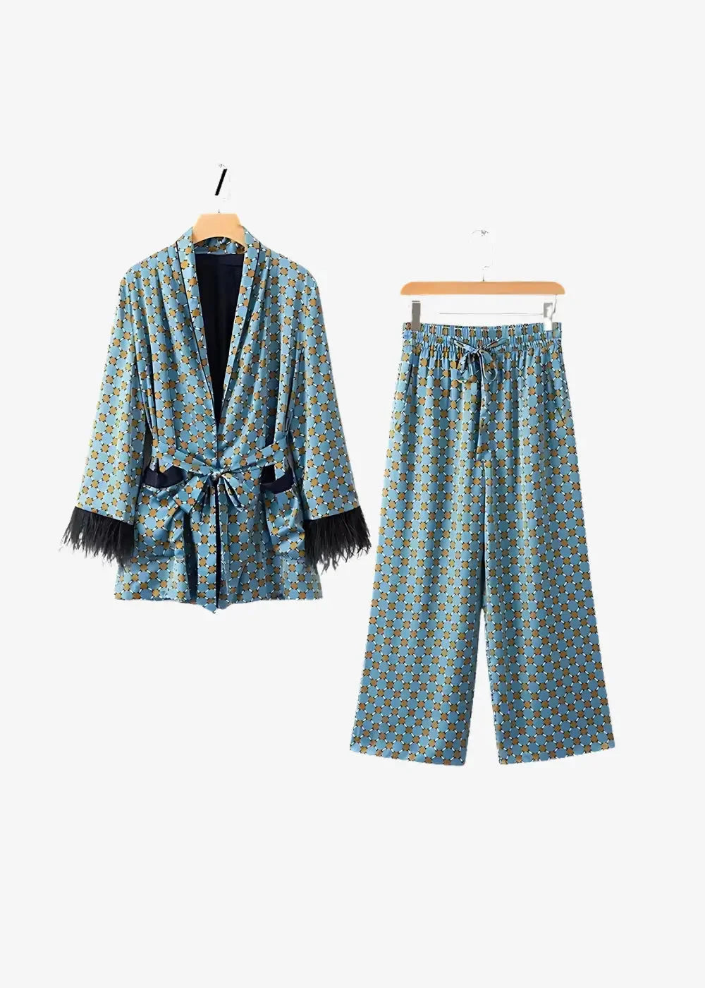Teal patterned satin geometric kimono pajama set with black fringe trim on sleeves and pockets and drawstring waist