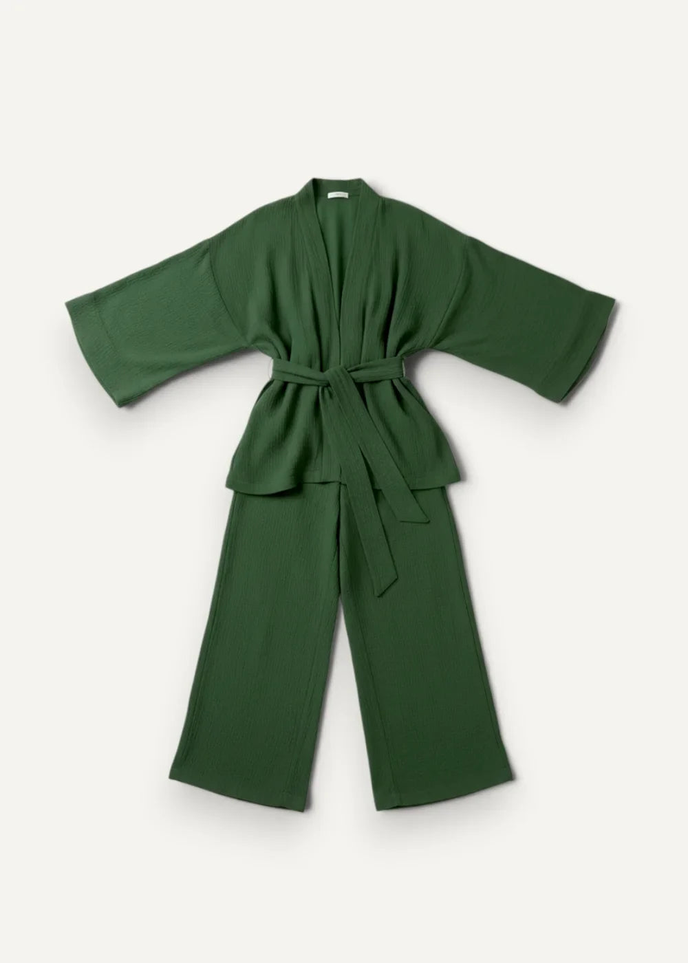 Deep forest green cotton kimono pajamas featuring flowing wide-sleeved robe and matching belted pants