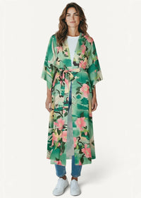 A flowing green floral kimono dress with long sleeves pink blossoms and dark leaf patterns