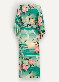 A flowing green floral kimono dress in vibrant teal with pink blossoms and white cranes on a serene backdrop