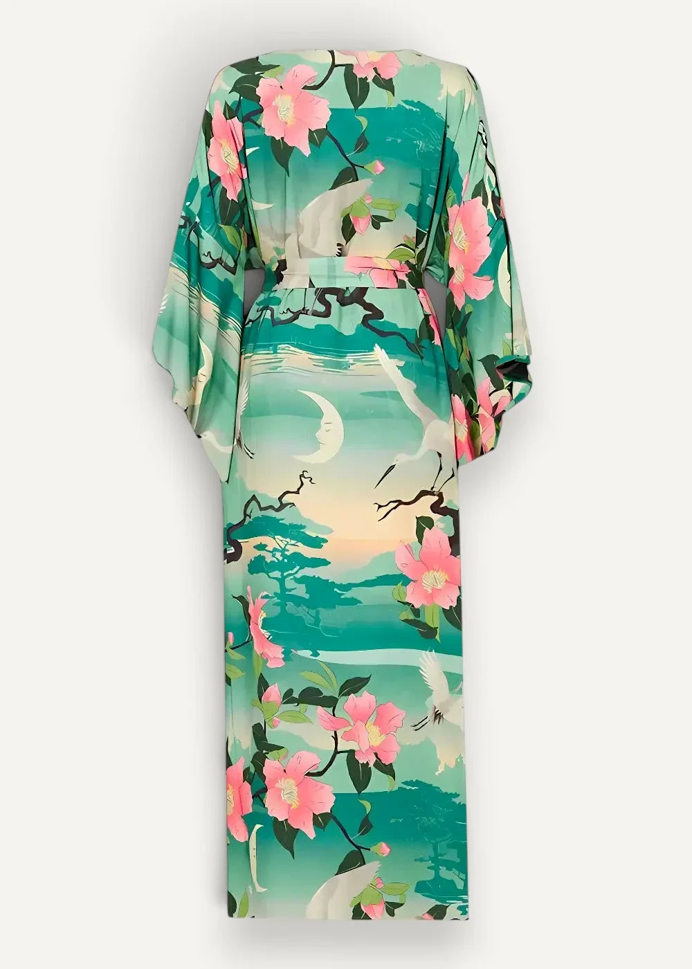 A flowing green floral kimono dress in vibrant teal with pink blossoms and white cranes on a serene backdrop