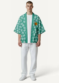 Green haori kimono jacket featuring green fabric with white leaf motifs and an orange circular chest patch