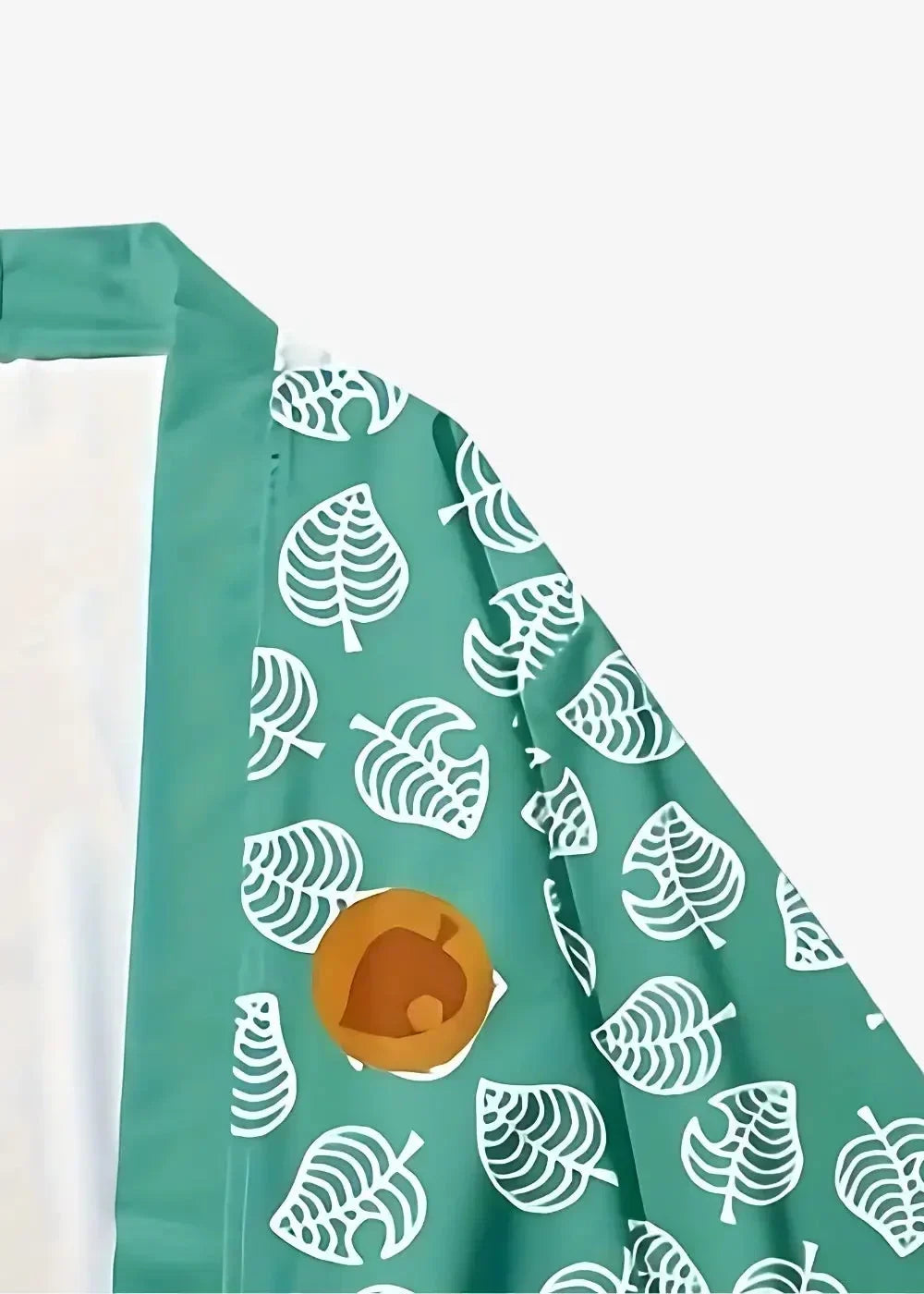 Green haori teal fabric apron with white leaf pattern and orange animal crossing logo emblem on the front