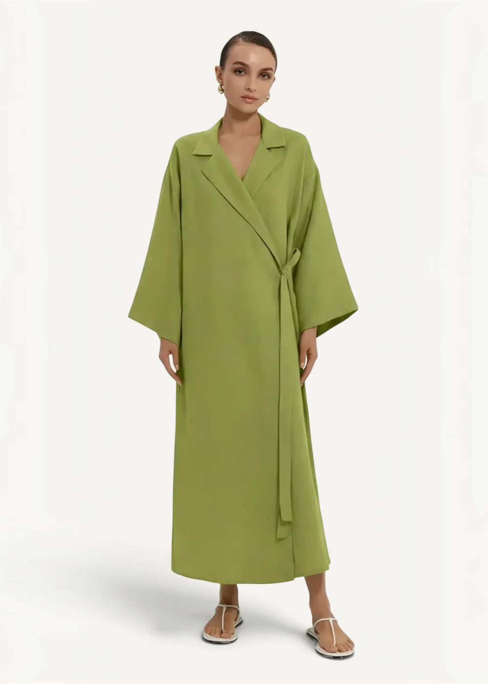 Green kimono dress featuring a long olive green wrap coat with wide sleeves and a belted waist