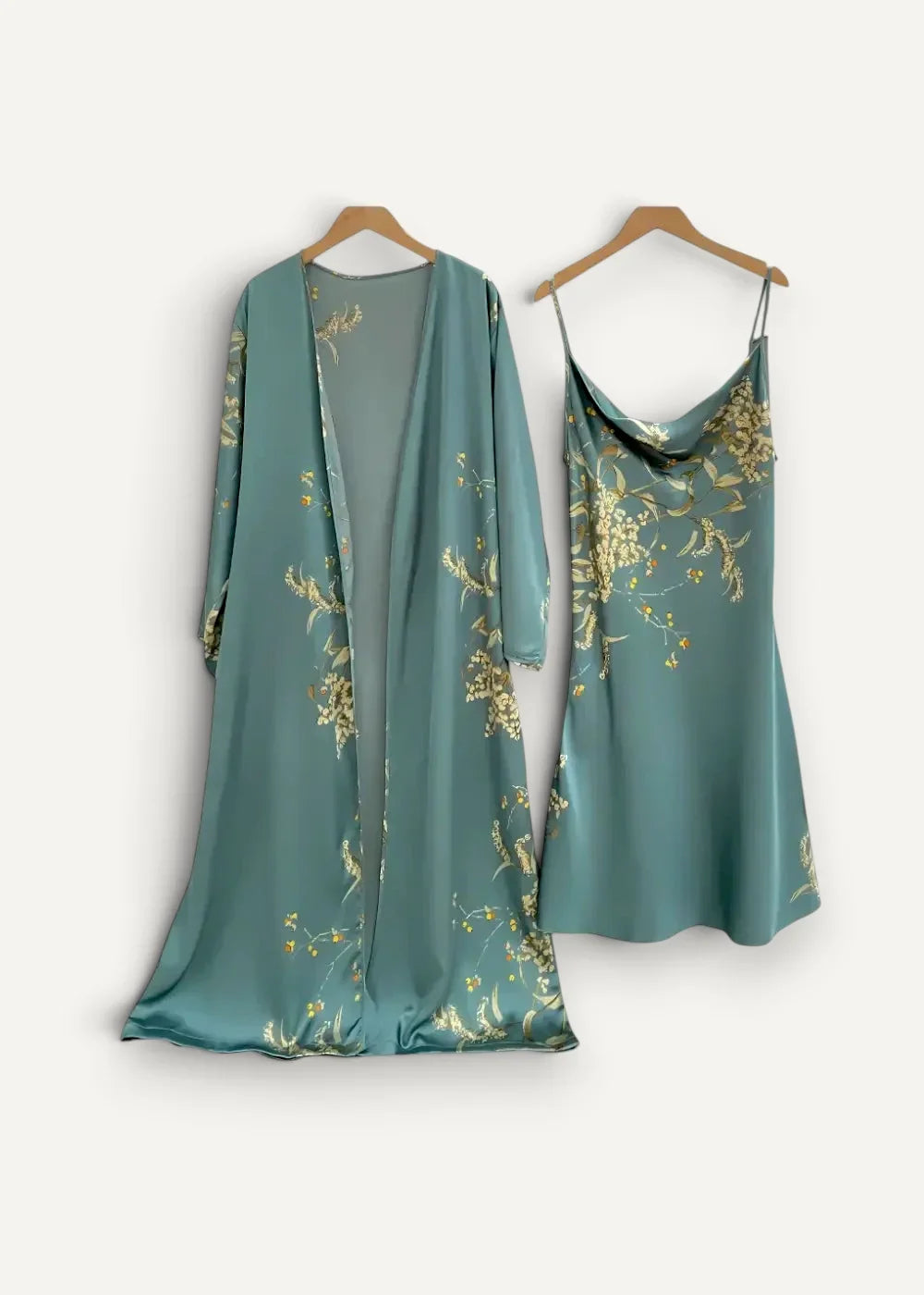 Green nightgown and robe set in teal satin with delicate gold floral embroidery on a long-sleeved flowing robe and slip dress