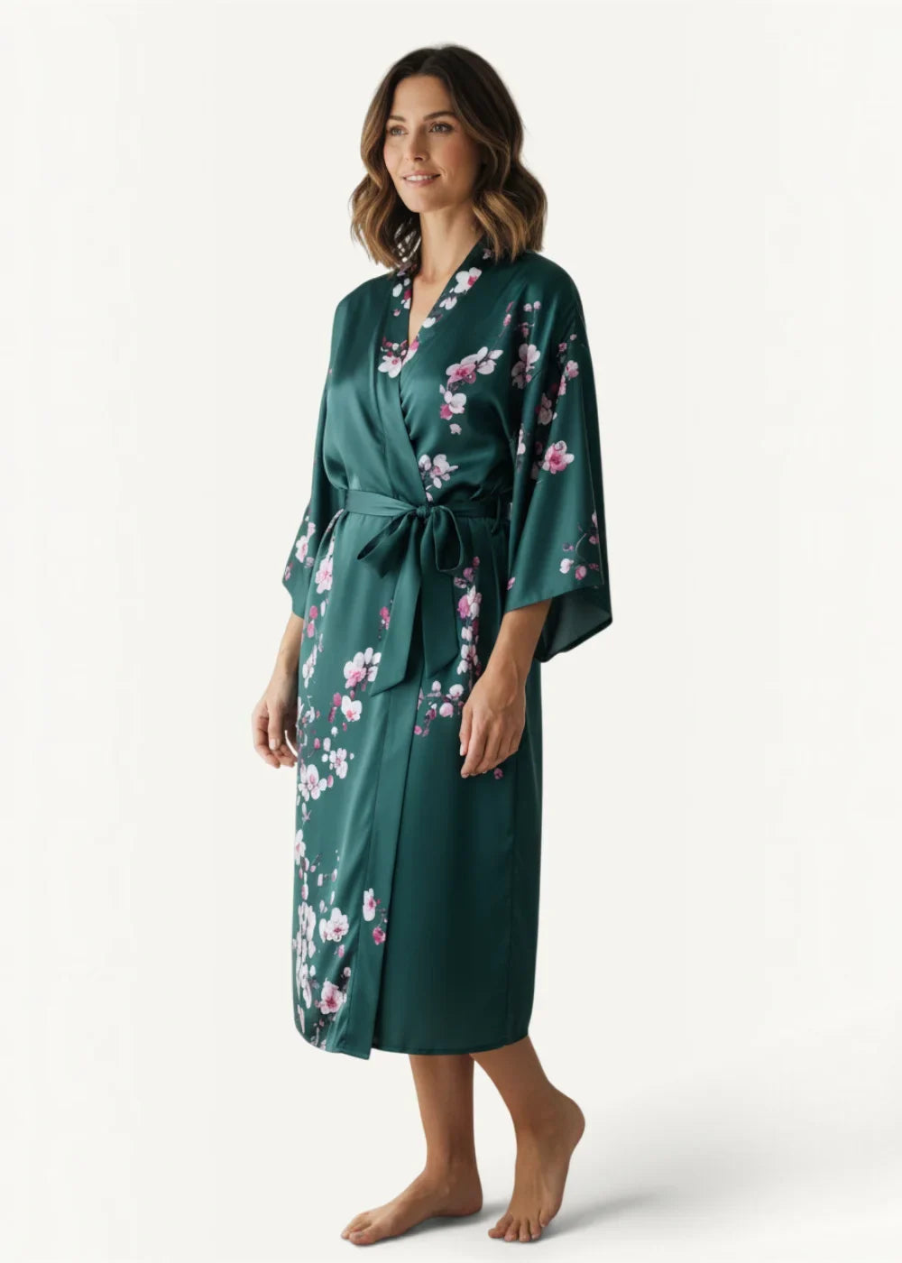 Emerald green satin robe with delicate pink and white floral pattern belted waist and three quarter length sleeves