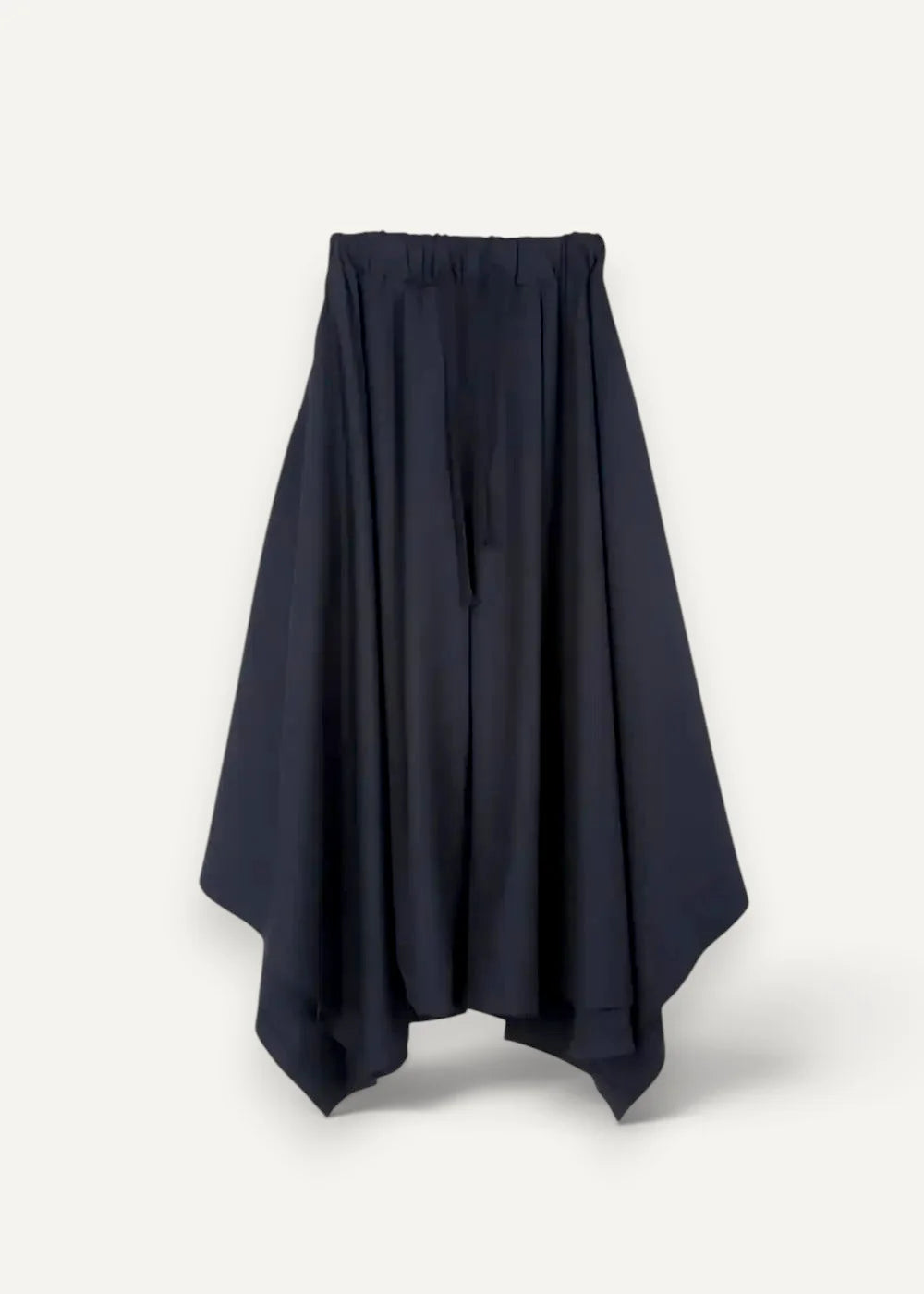 Black high-waisted asymmetrical skirt with elastic waistband and flowing silhouette shown from the back in haori coat style
