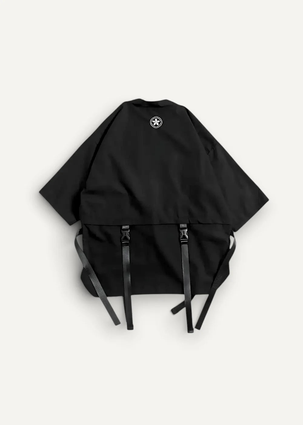 Black oversized haori coat with short sleeves white star logo on back and adjustable black straps at hem back side view