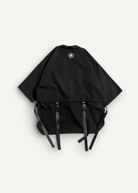 Black oversized haori coat with short sleeves white star logo on back and adjustable black straps at hem back side view