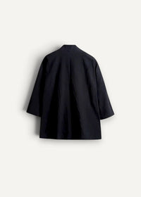 Black minimalist haori kimono jacket with three quarter sleeves and relaxed fit shown from the front