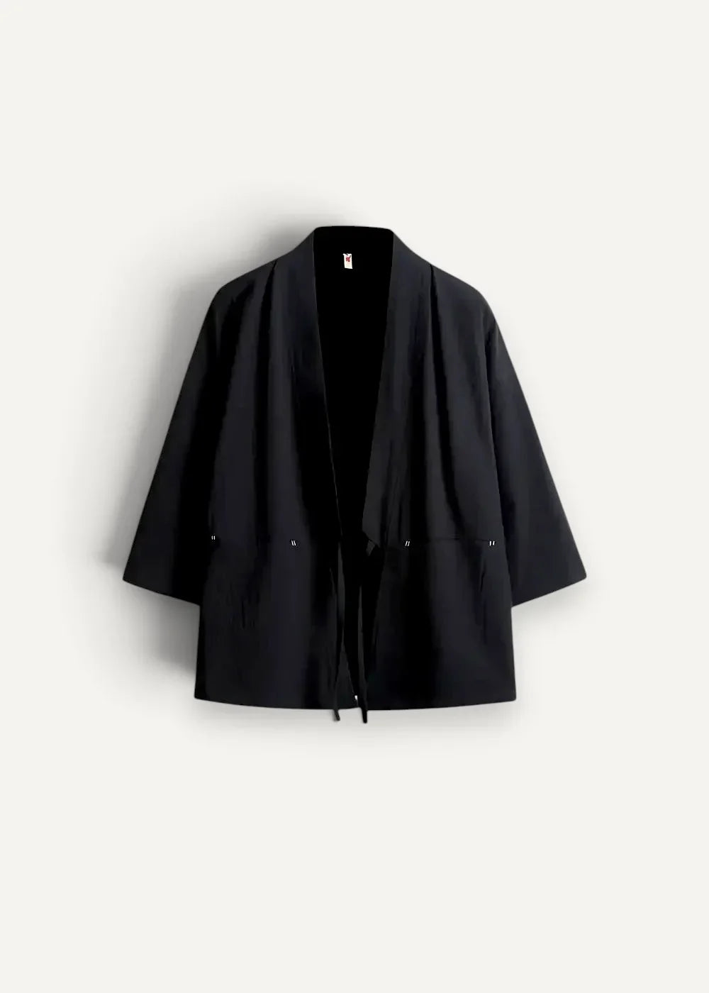 Black minimalist haori kimono jacket with open front three quarter sleeves and subtle front pockets