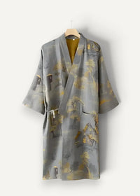 Gray silk Japanese bathrobe kimono with a subtle gold village scene print and traditional wrap design with tie belt