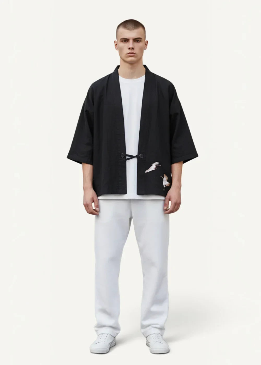 Black embroidered crane Japanese haori jacket with minimalist design and loose three-quarter sleeve cut