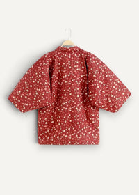 Red floral-patterned Japanese haori jacket with short puffy sleeves and high collar for stylish layering