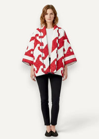 Red and white geometric-patterned quilted cape with textured glittery finish japanese kimono jacket