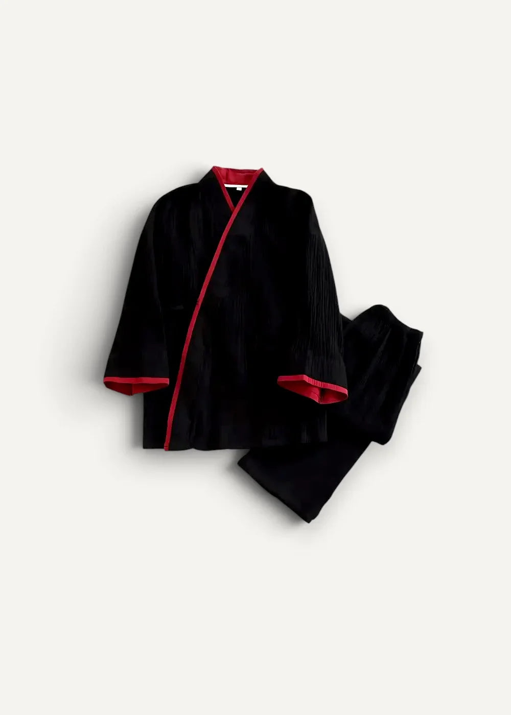 Black velvet Japanese kimono pajamas with red trim featuring a soft luxurious fabric and classic style