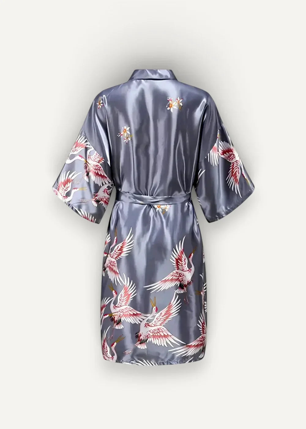 A sleek satin-gray Japanese kimono robe adorned with a vibrant pattern of red and white cranes in flight