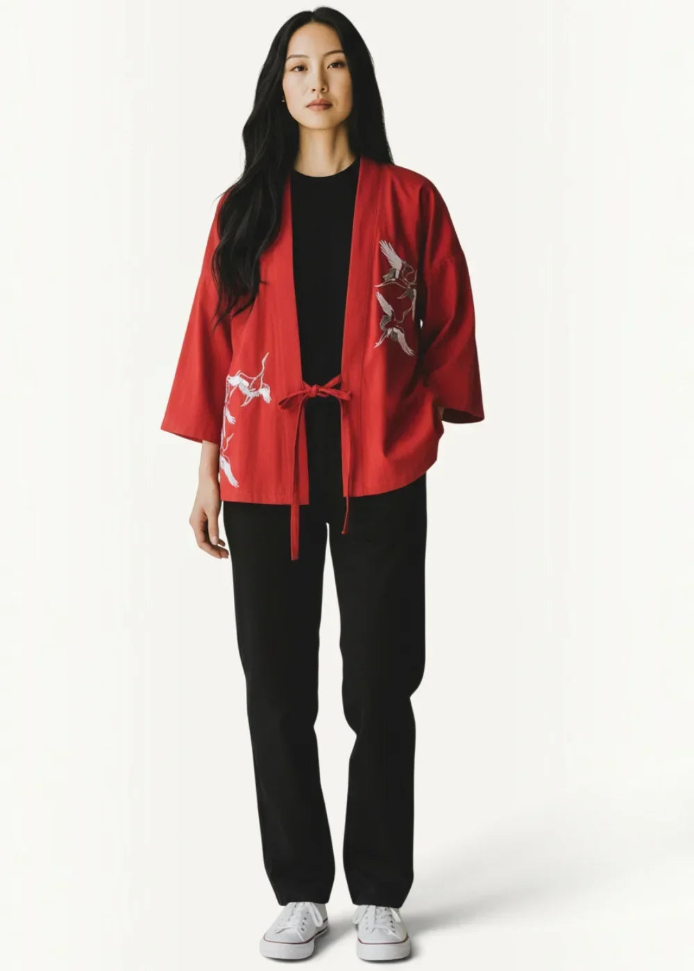 Red embroidered Japanese kimono style jacket with white and silver bird motifs on traditional silk fabric