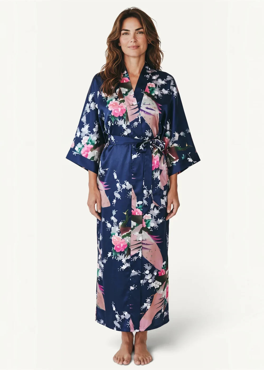 A navy blue satin Japanese silk kimono robe with vibrant pink roses white blossoms and green leaf floral pattern