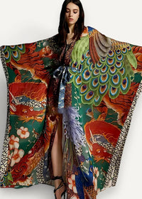 A vibrant green Japanese traditional kimono with wide sleeves and red dragon and peacock feather patterns on silk