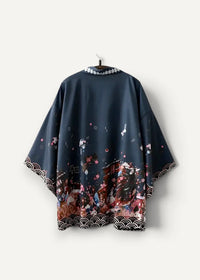 Dark blue satin japanese traditional haori with vibrant anime print cherry blossoms and white wave patterns on hem and cuffs