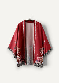 A vibrant red Japanese traditional haori kimono with intricate floral wave patterns and white lace trim along edges