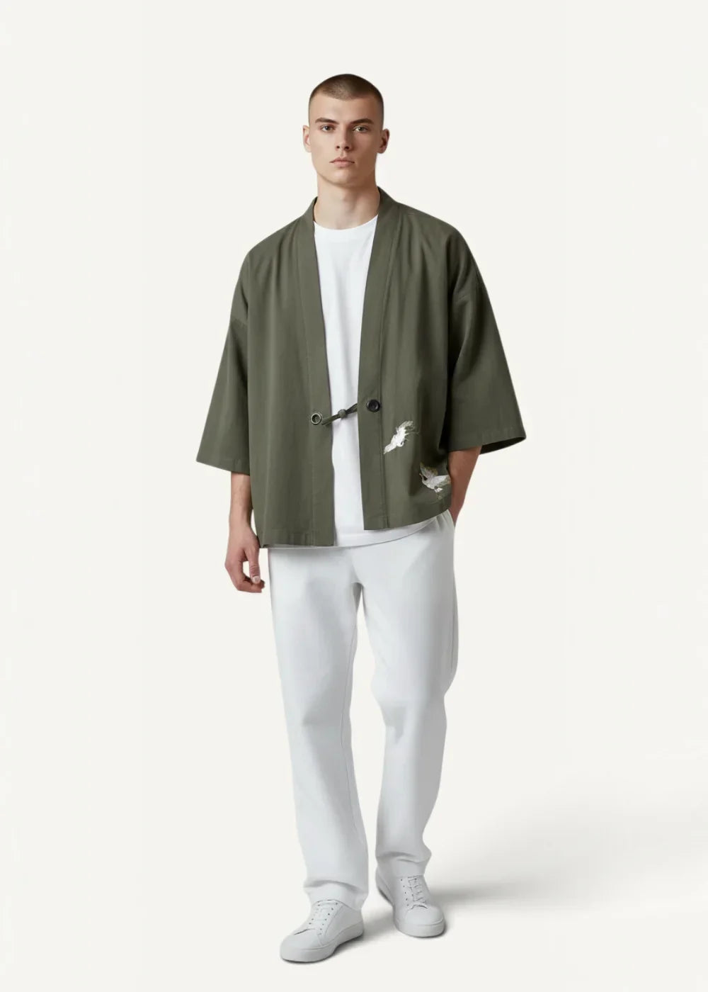 Olive green unstructured khaki haori jacket with distressed patchwork detail and black toggle closures