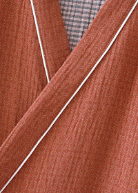 Kimono bathrobe men’s rust-colored quilted robe with subtle diamond pattern and white piping along the edges