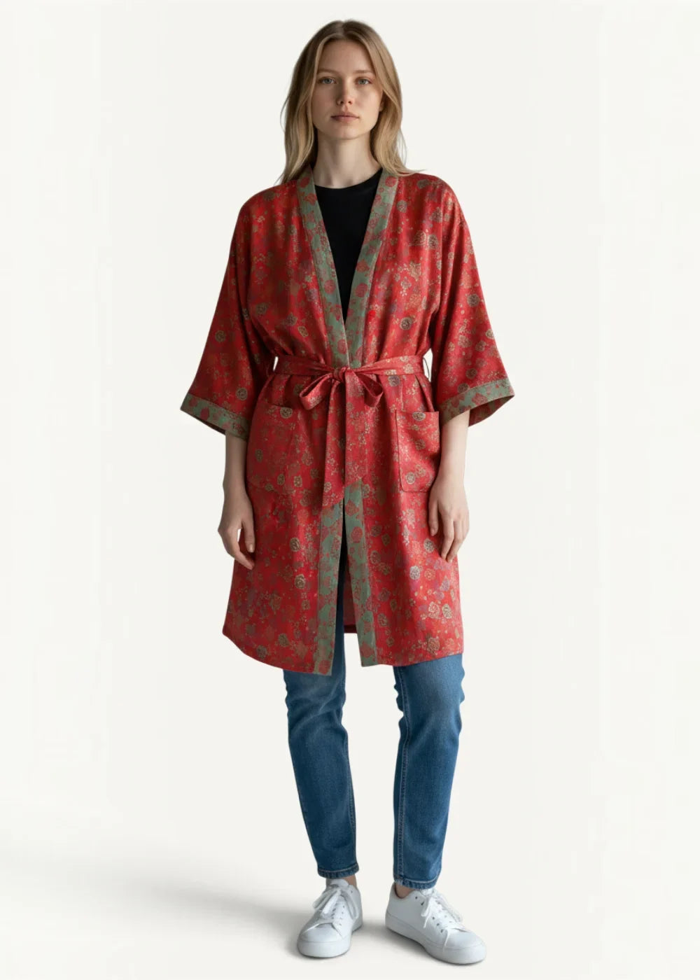 A vibrant red silk kimono bathrobe for women with gold floral pattern and sage green trim tied at the waist