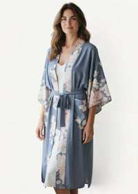 Kimono cardigan cover up in soft blue satin fabric with pink floral design and matching belt for lightweight layering