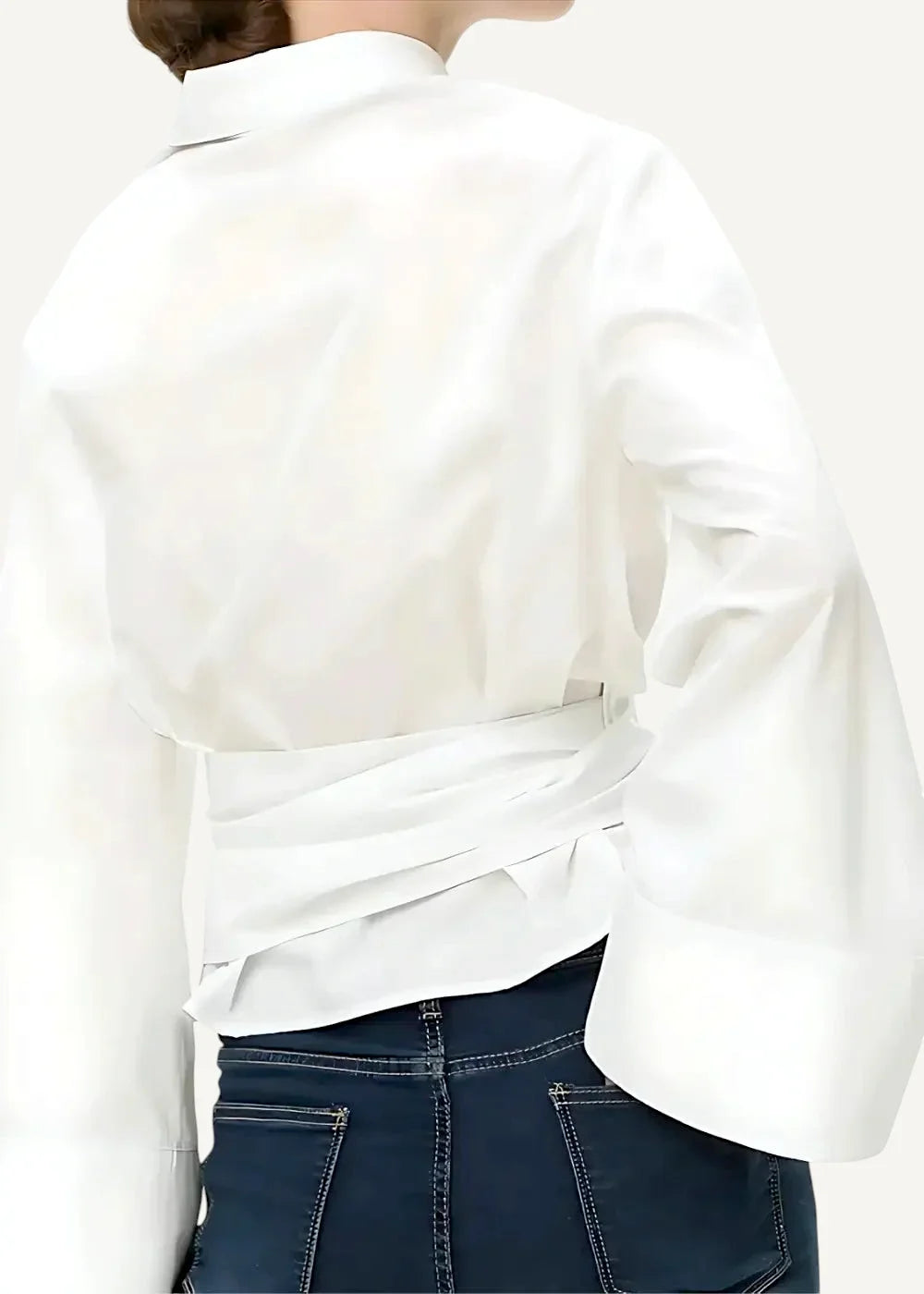 A white kimono cardigan short with long sleeves, cinched waist, and voluminous fabric for stylish layering