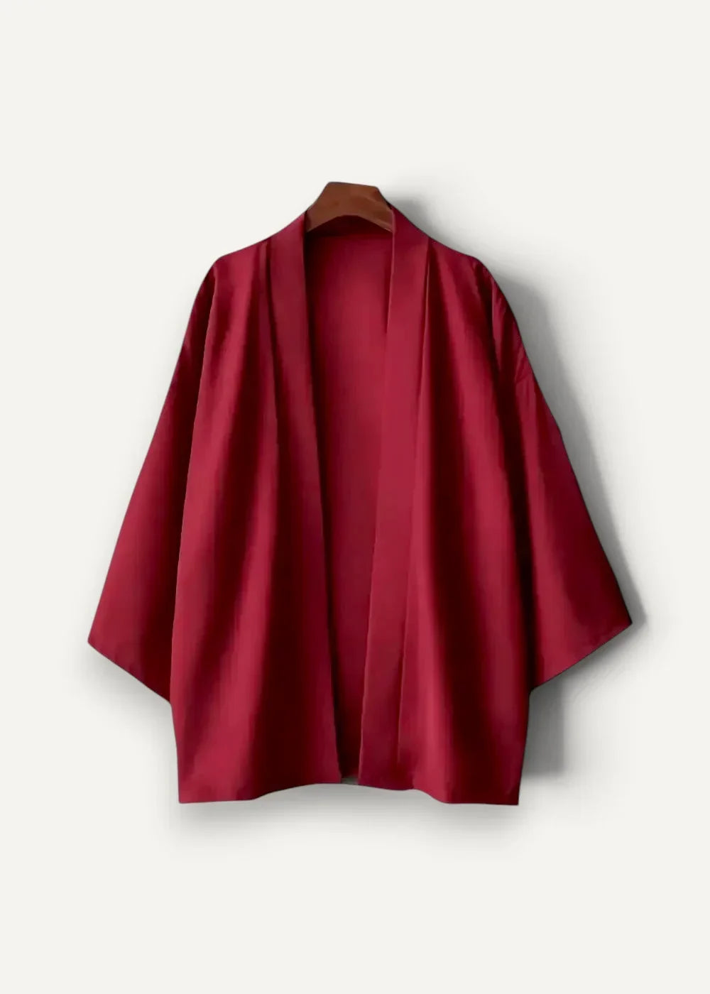 A rich crimson silk kimono coat mens with wide flowing sleeves and a traditional open front design