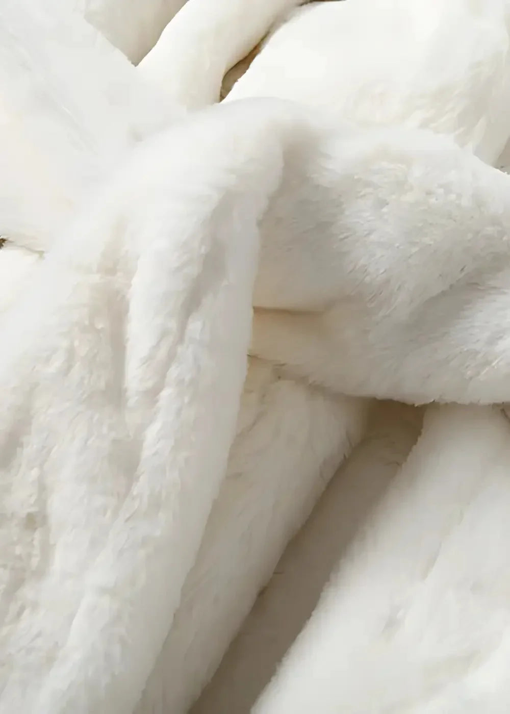 Soft white faux fur kimono coat with plush textured surface for cozy stylish wear