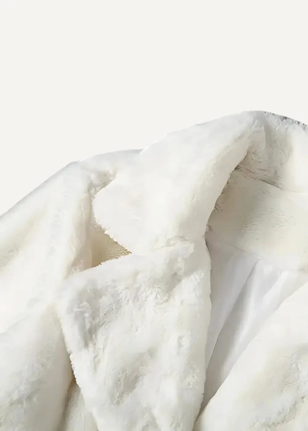 White faux fur kimono coat blanket with soft plush texture and gentle folds