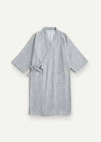 A light gray cotton kimono dressing gown with a subtle white constellation pattern and matching tie belt
