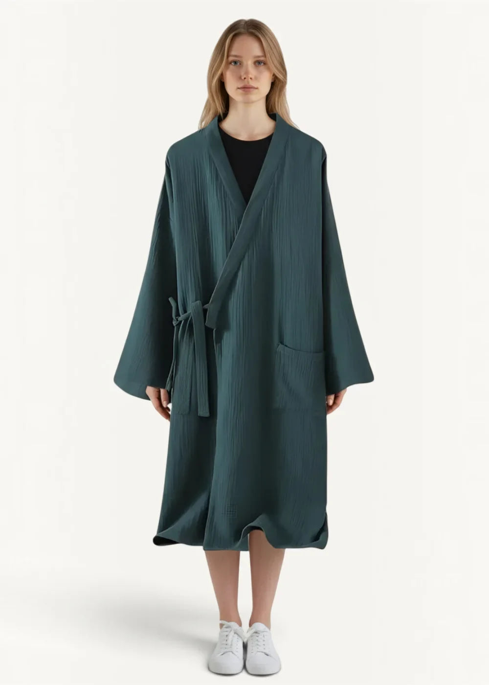 A dark teal kimono dressing robe with long sleeves textured fabric and matching tie belt