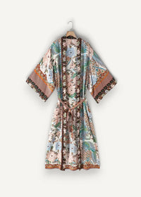 Kimono duster cardigan long sleeved robe with pastel floral bird pattern and brown trim along edges and front opening