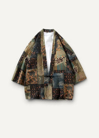 Patchwork-style kimono haori jacket in green and brown with intricate floral and geometric patterns visible on the back