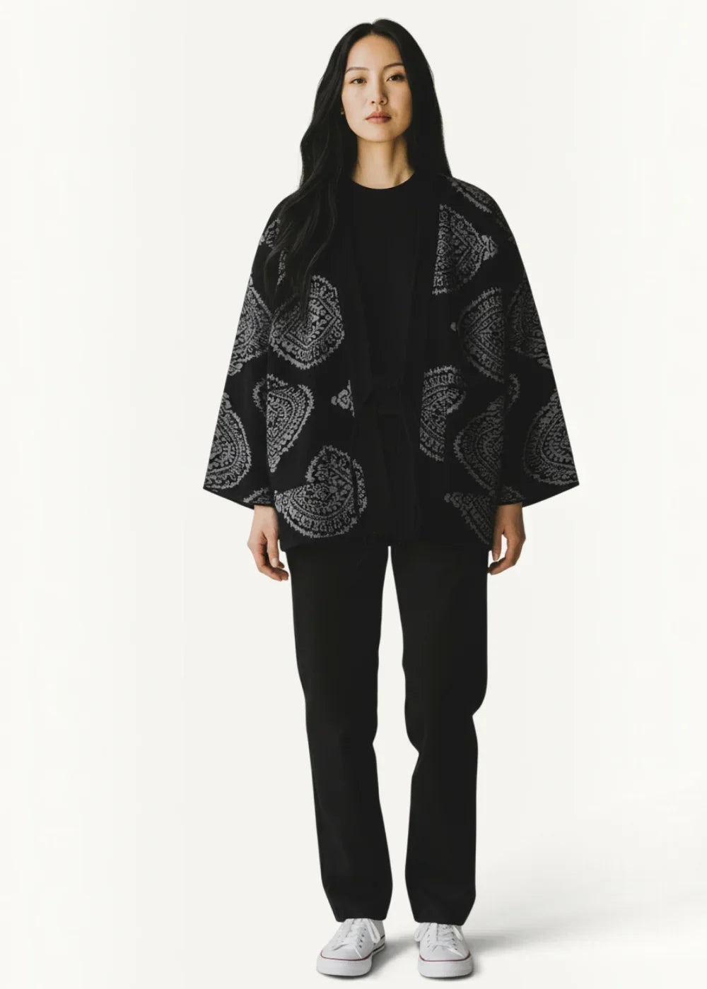 Black kimono jacket with intricate silver paisley patterns in cape style for traditional wear