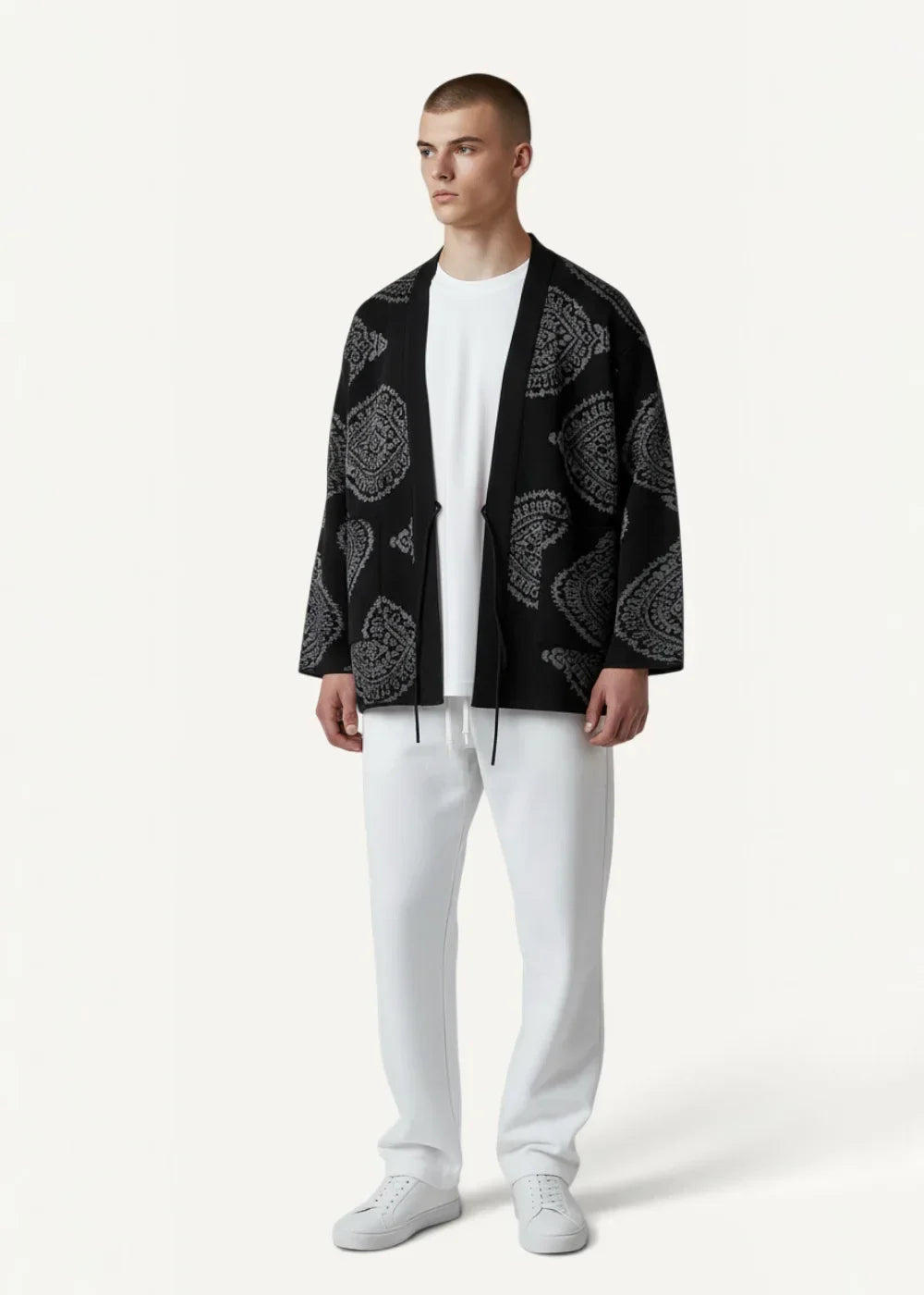 Black cardigan kimono jacket with intricate gray paisley pattern and relaxed fit inspired by traditional Japanese design