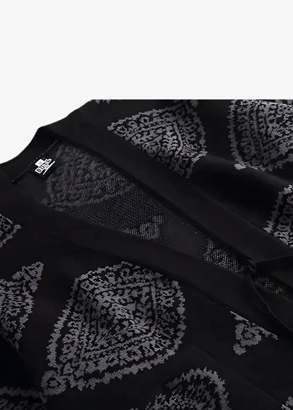Black kimono jacket with intricate silver paisley embroidery on a traditional cardigan style fabric