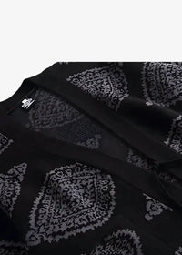 Black kimono jacket with intricate silver paisley embroidery on a traditional cardigan style fabric