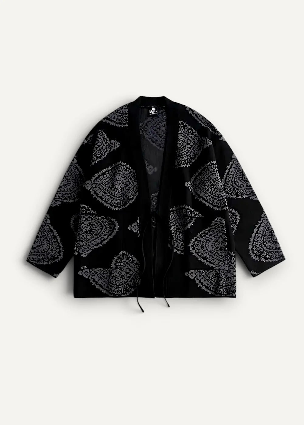 Black kimono jacket with bold silver paisley pattern and drawstring hem in traditional style