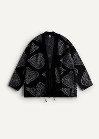Black kimono jacket with bold silver paisley pattern and drawstring hem in traditional style