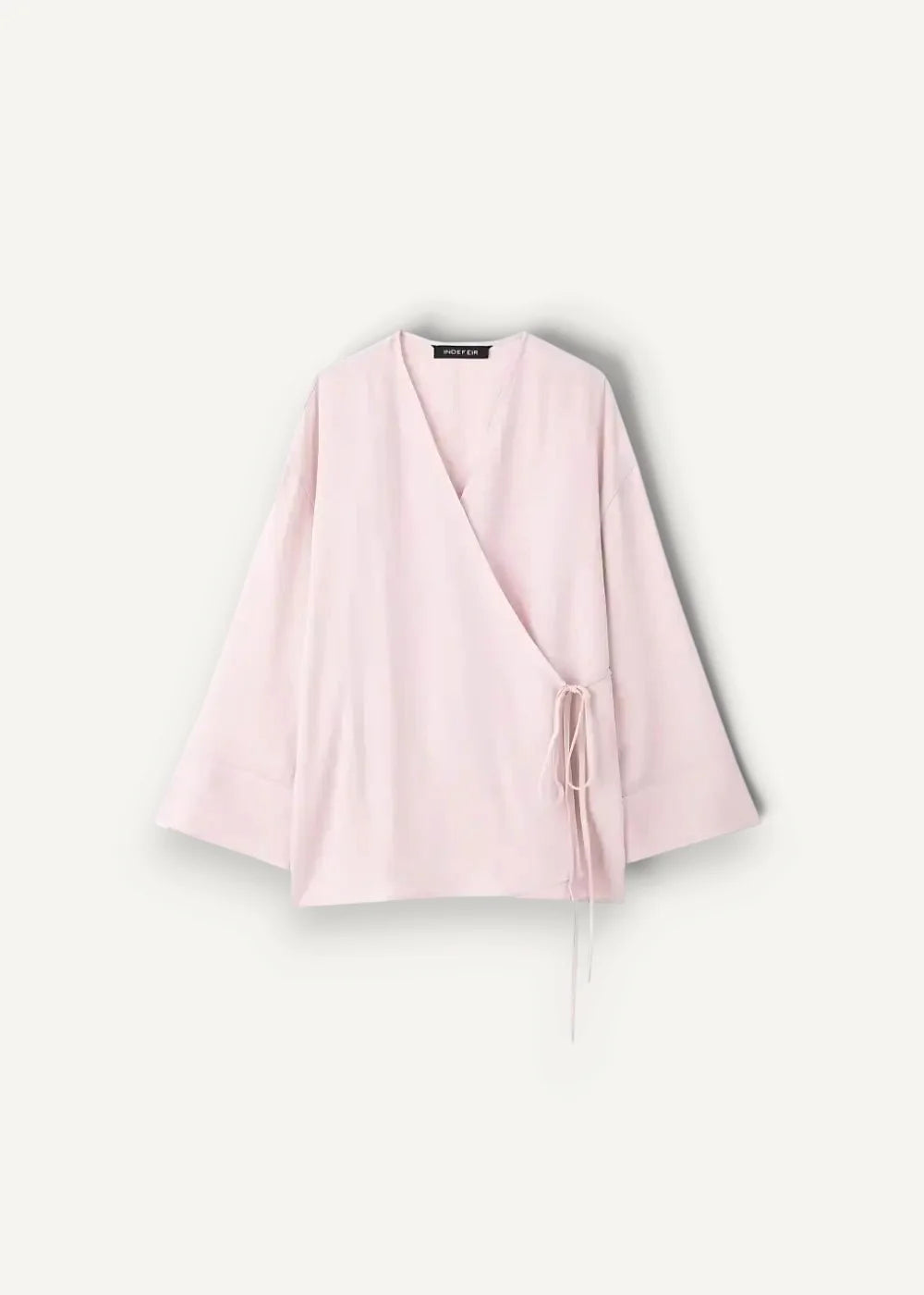 A soft pink kimono linen set blouse with lightweight fabric v-neckline and matching drawstring tie at the waist