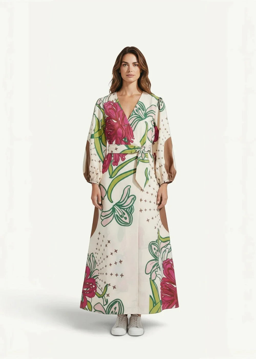 A flowing off-white kimono print dress with bold pink green floral patterns and star accents