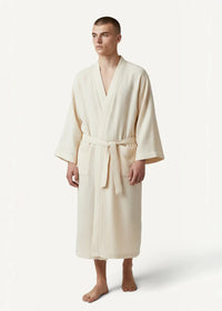 Cream-colored kimono robe dressing gown made of textured cotton with v-neck and matching belt