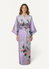 Lavender silk kimono bathrobe with delicate peacock and rose pattern tied at the waist with matching ribbon
