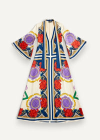 A cream silk kimono style dress with bold red roses and purple motifs framed by gold and navy geometric patterns