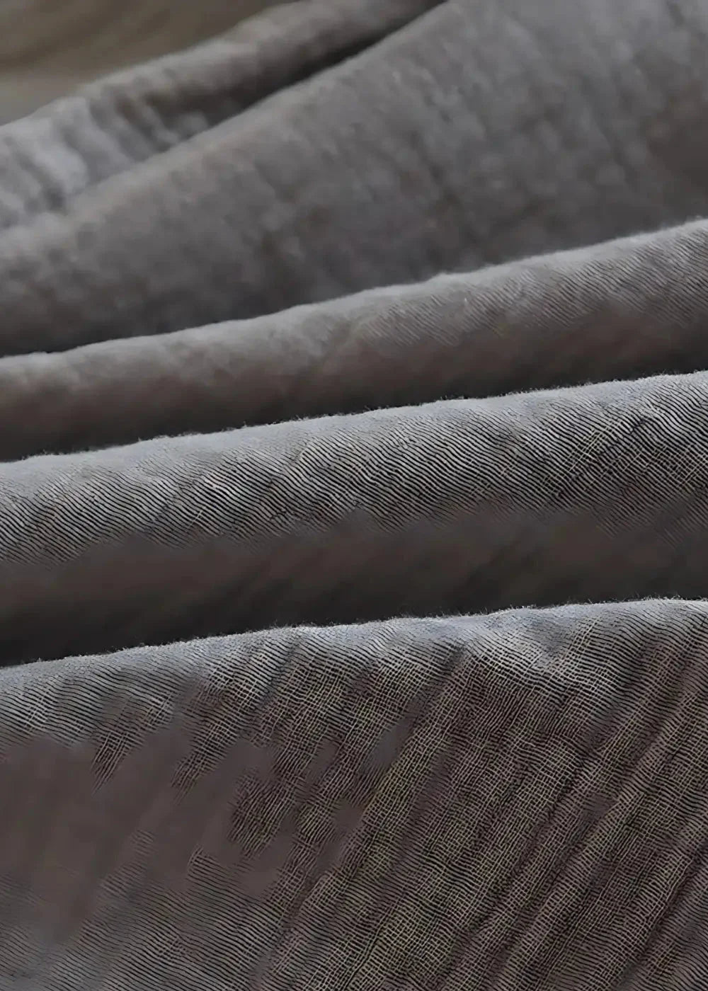 Soft textured gray fabric with a subtle woven pattern in kimono style pajama set material